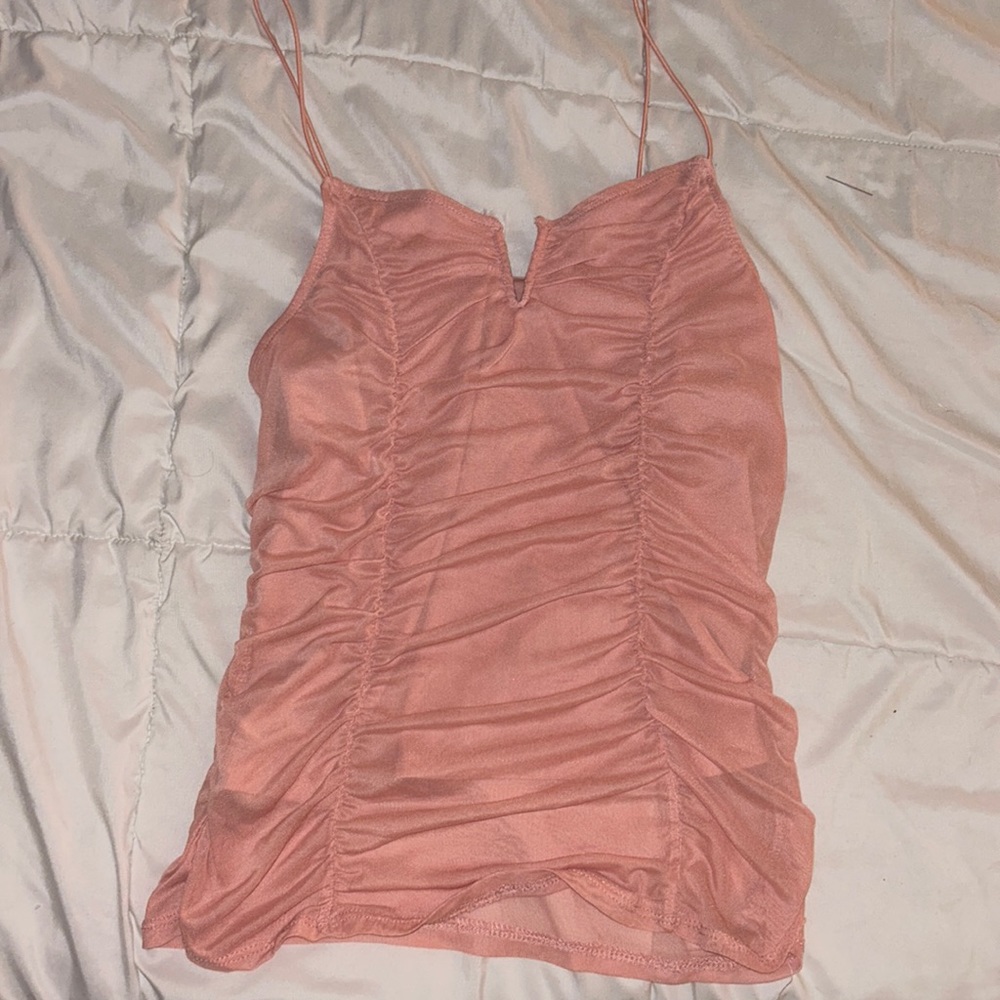 Spaghetti strap pink ruffle tank top